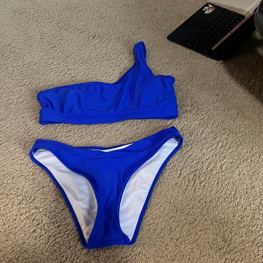 NEVER WORN Neon blue one shoulder swimsuit
